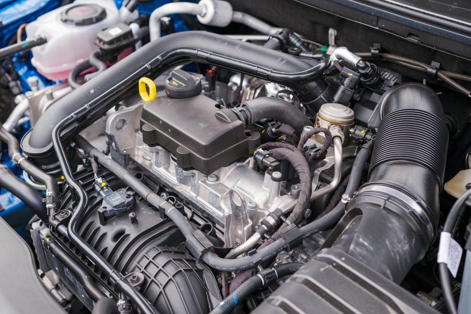 Engine compartment of a modern car, repair or service of automobile.